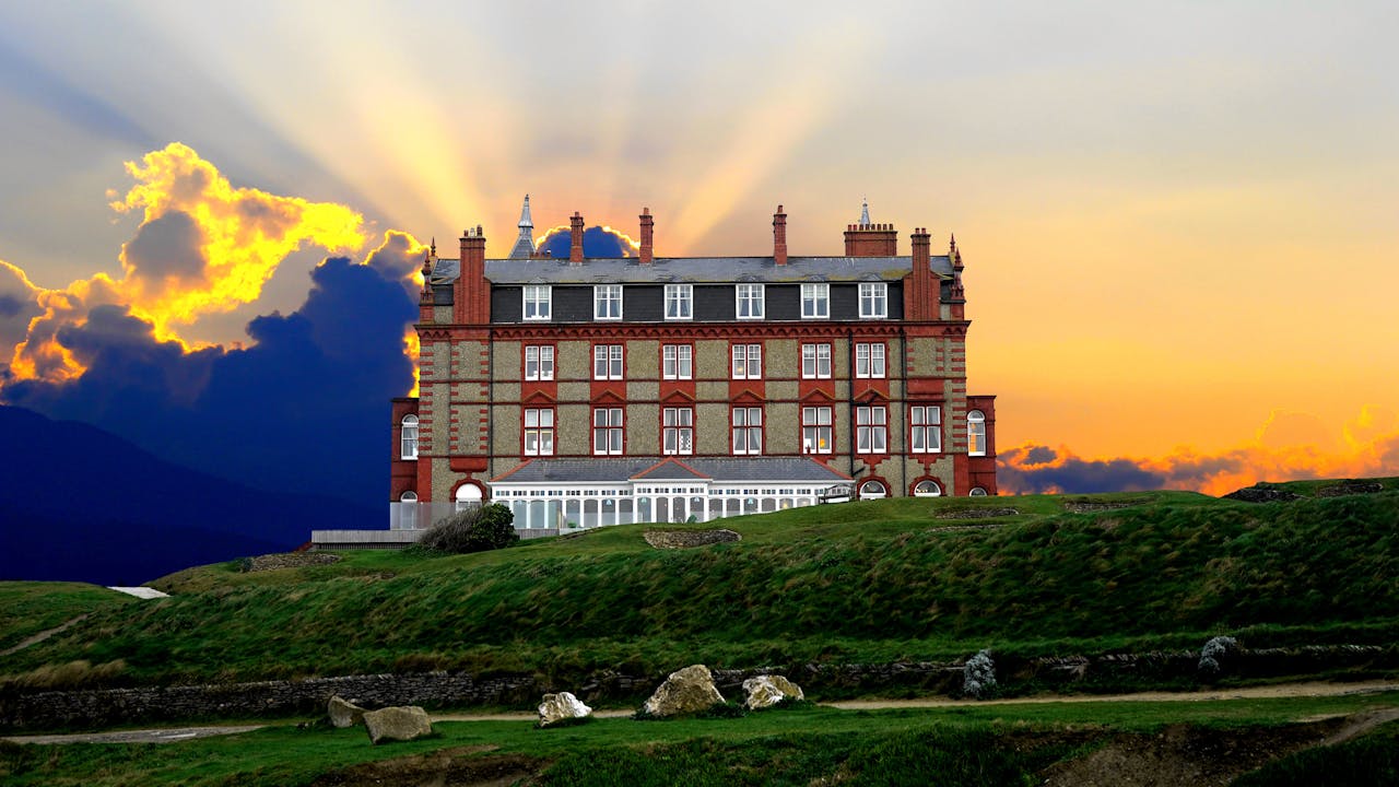 A stunning hotel exterior during sunset, located in Newquay, Cornwall.